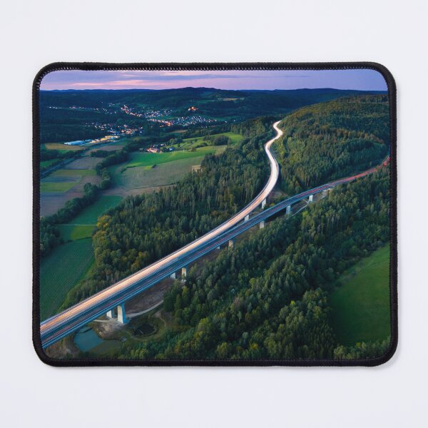Item preview, Aerial view of highway splitting aound forest hill designed and sold by raphotography88.