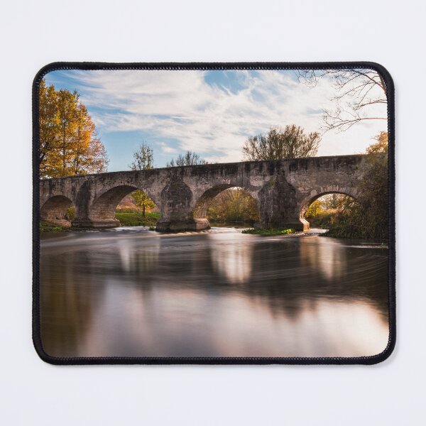 Item preview, Bridge over river Altmühl lighten up in autumn mood designed and sold by raphotography88.