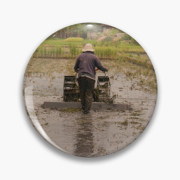 Item preview, A man in backside view plows a village rice field. designed and sold by kall3bu.