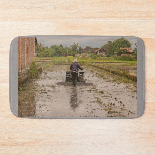 Item preview, A man in backside view plows a village rice field. designed and sold by kall3bu.
