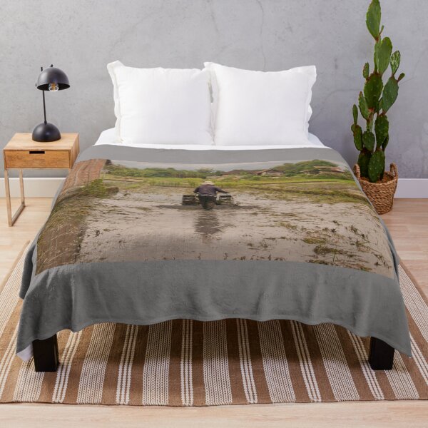 Item preview, A man in backside view plows a village rice field. designed and sold by kall3bu.