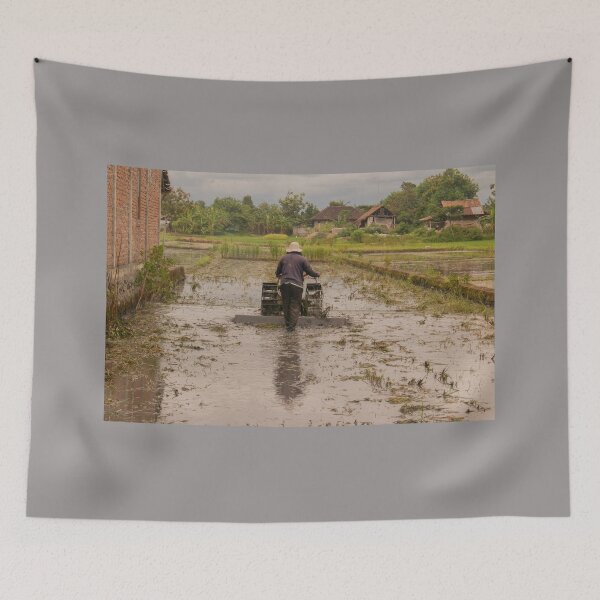 Item preview, A man in backside view plows a village rice field. designed and sold by kall3bu.