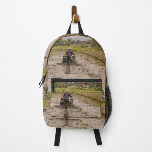 Item preview, A man in backside view plows a village rice field. designed and sold by kall3bu.