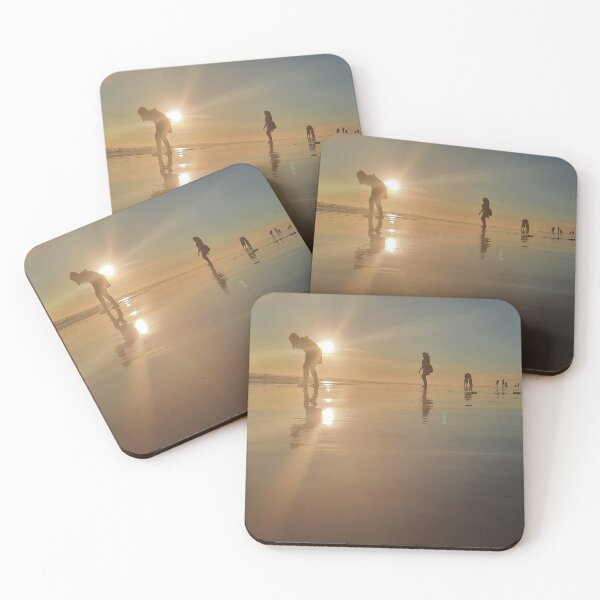 Item preview, Silhouetted people in a row on a sand beach. designed and sold by kall3bu.
