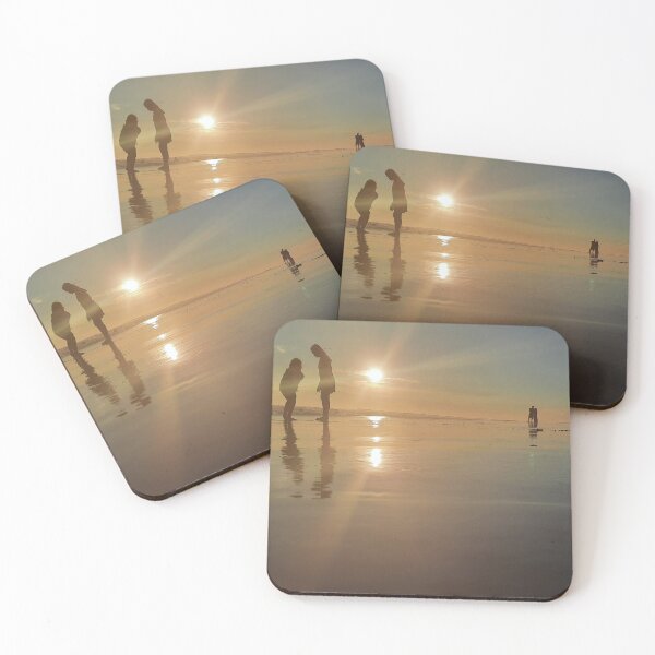 Item preview, Silhouetted people in a row on a sand beach. designed and sold by kall3bu.