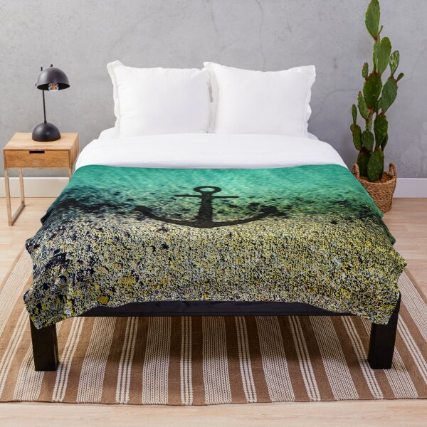 Anchored to the shore Throw Blanket