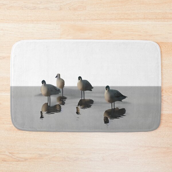 Item preview, Four water birds on a grey beach. White background designed and sold by janesg.