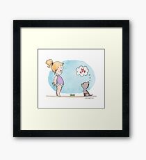 Little girl and a kitten Framed Print