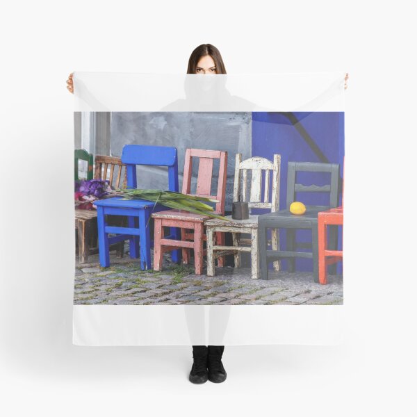 Item preview, Old multi-colored kids high chairs stand in a row with various objects on them designed and sold by EG Creativity Art.