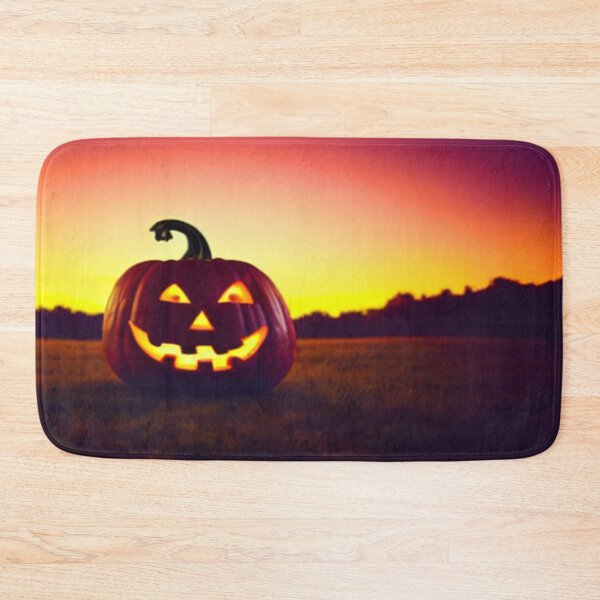 Item preview, Cheerful pumpkin lantern on sunset background  designed and sold by ErisMerch.