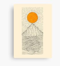 The sun over the mountain waves Canvas Print