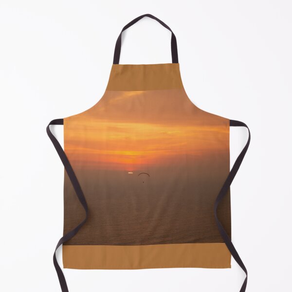 Item preview, Brillante puesta de sol dorada sobre el mar con un parapente designed and sold by kall3bu.