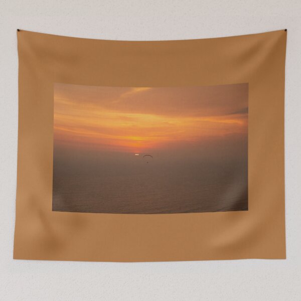 Item preview, Bright golden sunset over the sea with one paraglider designed and sold by kall3bu.