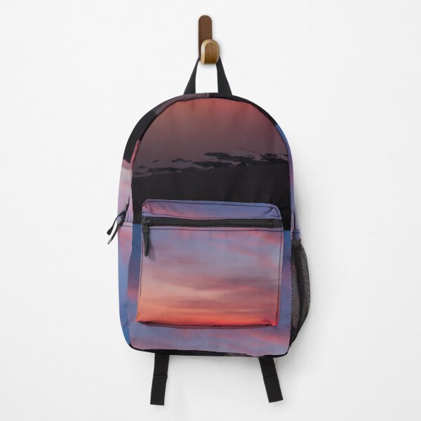 Item preview, Silhouetted rock stack at a red sunset beach designed and sold by kall3bu.