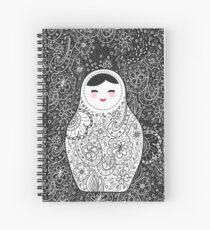 Cute doll matrioshka Babushka on black background Spiral Notebook