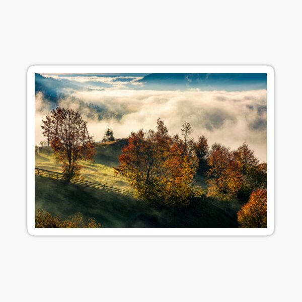 gorgeous countryside with rising fog in valley Sticker