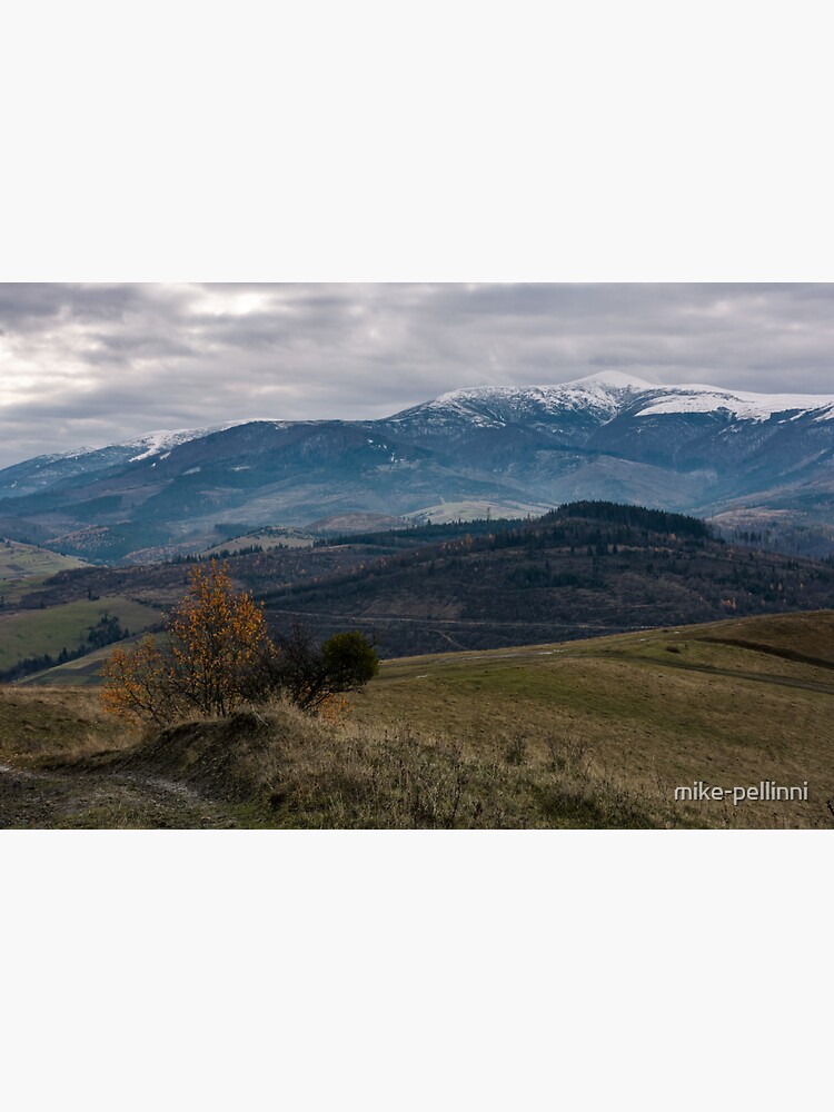 Thumbnail 3 of 3, Sticker, rolling hill with mountain ridge in late autumn designed and sold by mike-pellinni.