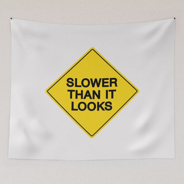 Item preview, Slower than it looks warning sign designed and sold by ApexFibers.