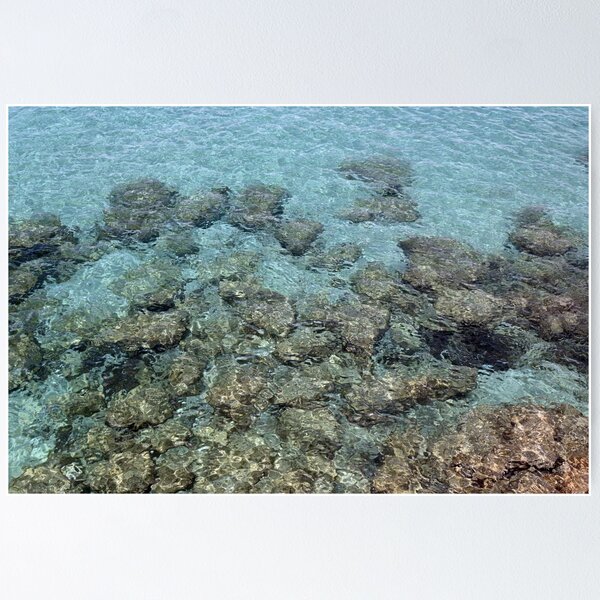 Rocks in the sea of Ibiza Poster