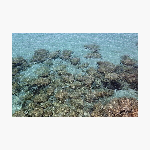 Rocks in the sea of Ibiza Photographic Print