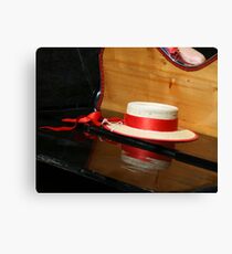 Straw hat on a gondola Canvas Print