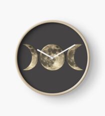 The triple moon Clock