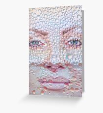Pretty girl face against transparent water drips as background. Greeting Card