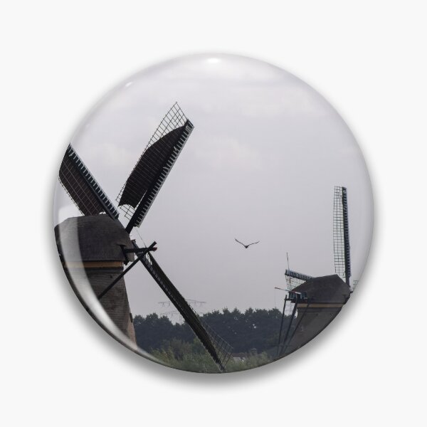 Item preview, Wonderful landscapes in the Netherlands. Historic dutch windmills in Kinderdijk in a cloudy autumn day. Unesco site. Natural view from distance. designed and sold by Maurizio Fabbroni.