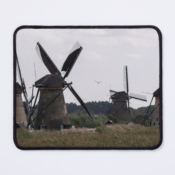 Item preview, Wonderful landscapes in the Netherlands. Historic dutch windmills in Kinderdijk in a cloudy autumn day. Unesco site. Natural view from distance. designed and sold by Maurizio Fabbroni.