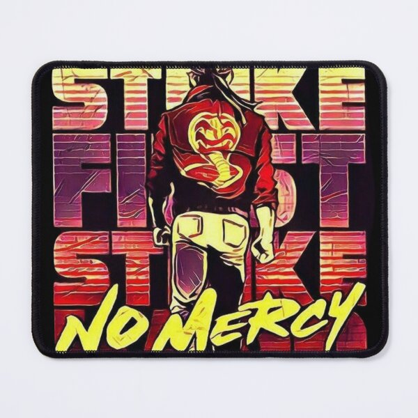 Item preview, Cobra Kai Strike First, Strike Hard, No Mercy T-shirt designed and sold by Enterna.