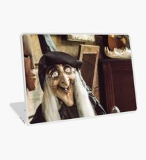 Vintage witch closeup log house Laptop Skin