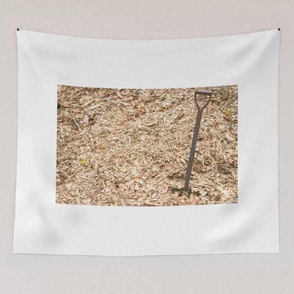 Item preview, Pile of sawdust wood chips background farm with metal rusty manure fork on left designed and sold by Nupu.