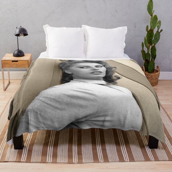 Item preview, Sophia Loren in front of a wooden door designed and sold by carmencuarzo.