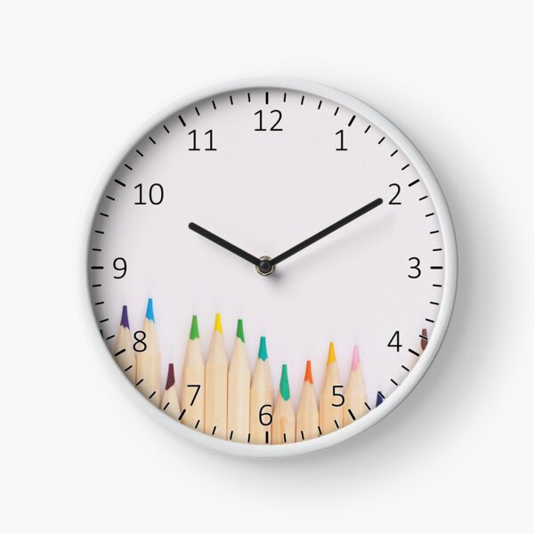 Close up Photo of Colored Pencils Clock