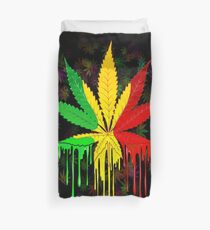 Funda nórdica Hoja de marihuana rasta colores pintura que gotea