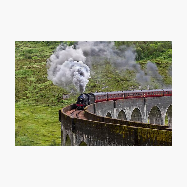 Steam train crossing the Glenfinnan Viaduct Photographic Print