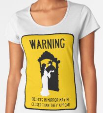 Camiseta premium para mujer Una nota de preocupación con respecto a los espejos