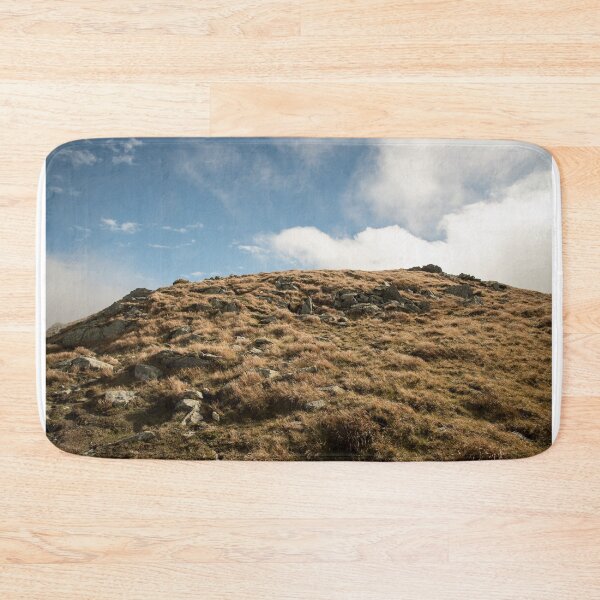 Item preview, hill covered by meadow with stones during autumn designed and sold by honza28683.