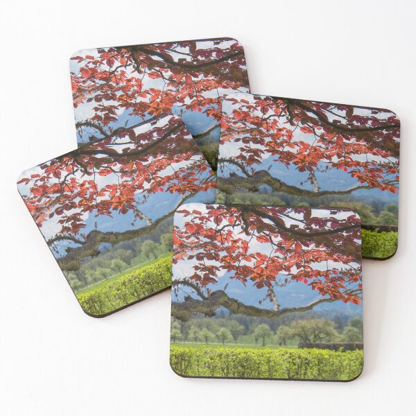 Item preview, Old tree with red foliage amid green garden. Beautiful summer background with tree and sky designed and sold by annamiss.