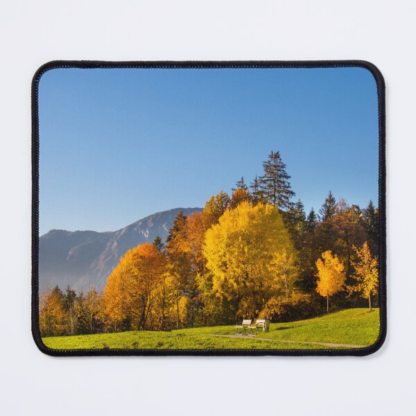 Artikelvorschau, Beautiful autumn landscape with forest, trees and the background of mountains. Forest view with blue skies and mountains on sunny, autumn day. Green field with view of autumn forest, mountains and sky entworfen und verkauft von annamiss.