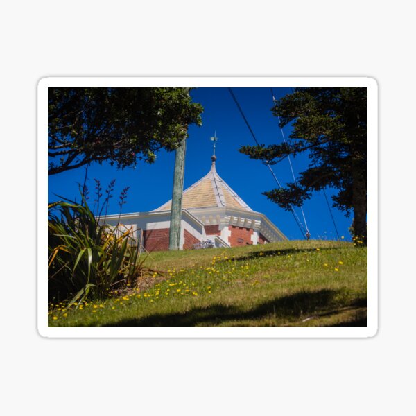 Item preview, Brick Building At The Top Of A Grass Slope designed and sold by Michael McGimpsey.