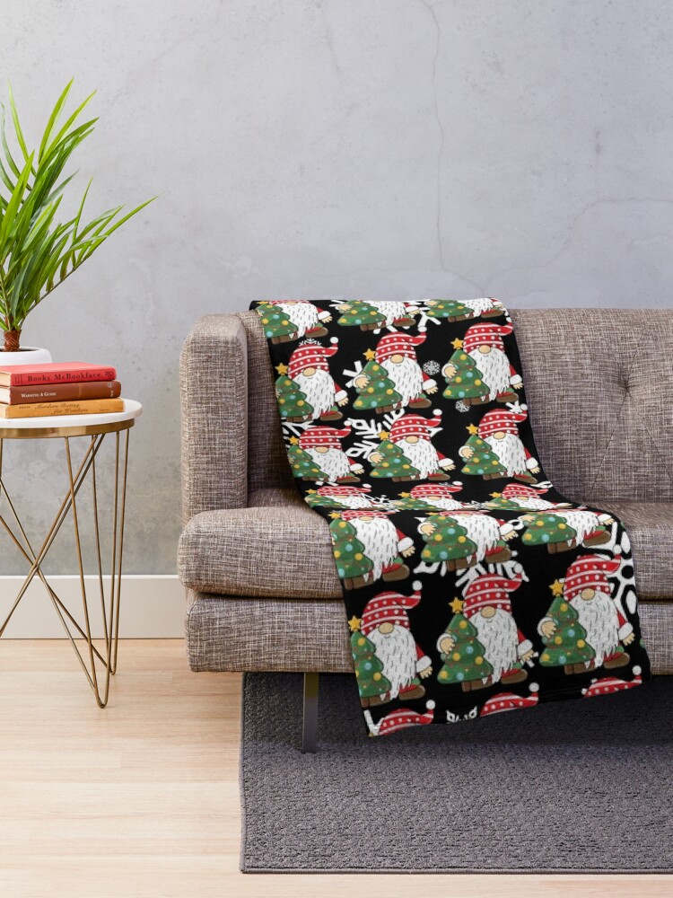 Disover Santa holding a Christmas tree pattern Throw Blanket