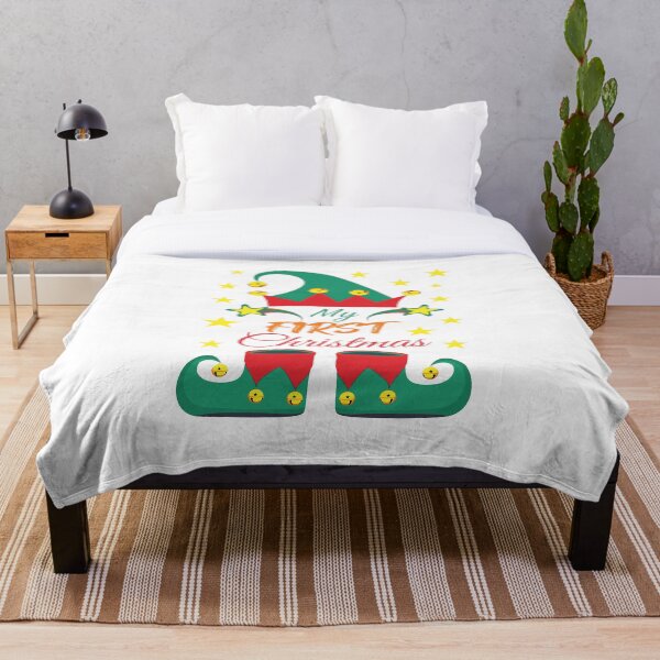 Aperçu de l'œuvre Mon premier Noël - Babysuit Redbubble créée et vendue par bluehatgraphics.