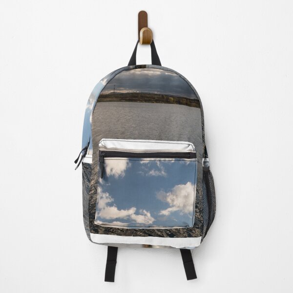 Item preview, lake with small wawes and blue sky with clouds designed and sold by honza28683.