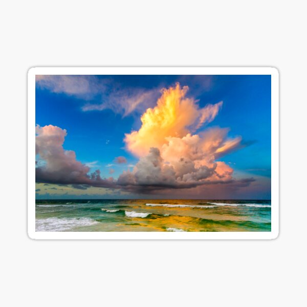 Golden cloud above the ocean. Sticker