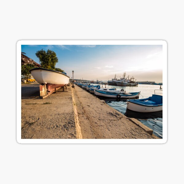 fishing boats in port of Sozopol at sunset Sticker