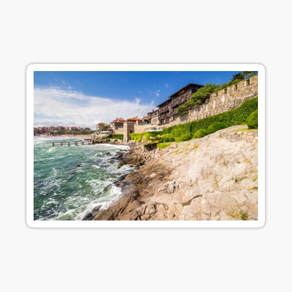 steps to the rocky shore from the old town Sticker