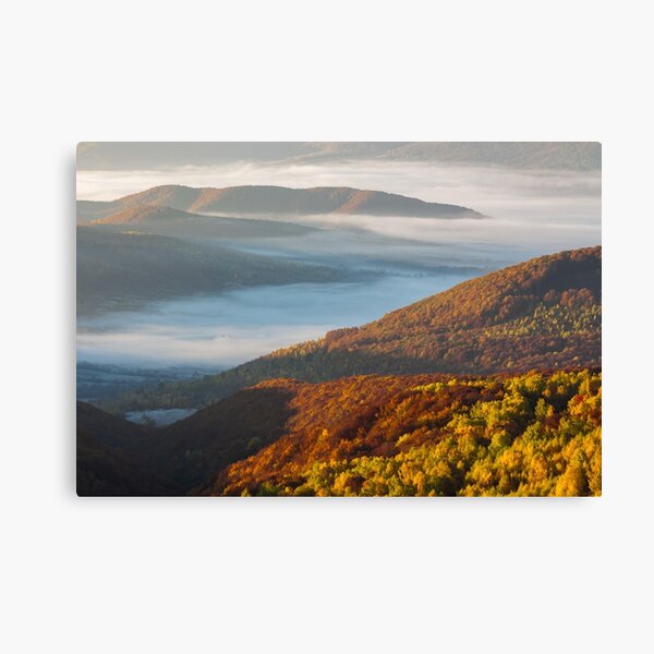 cold fog on hot sunrise in mountains Canvas Print