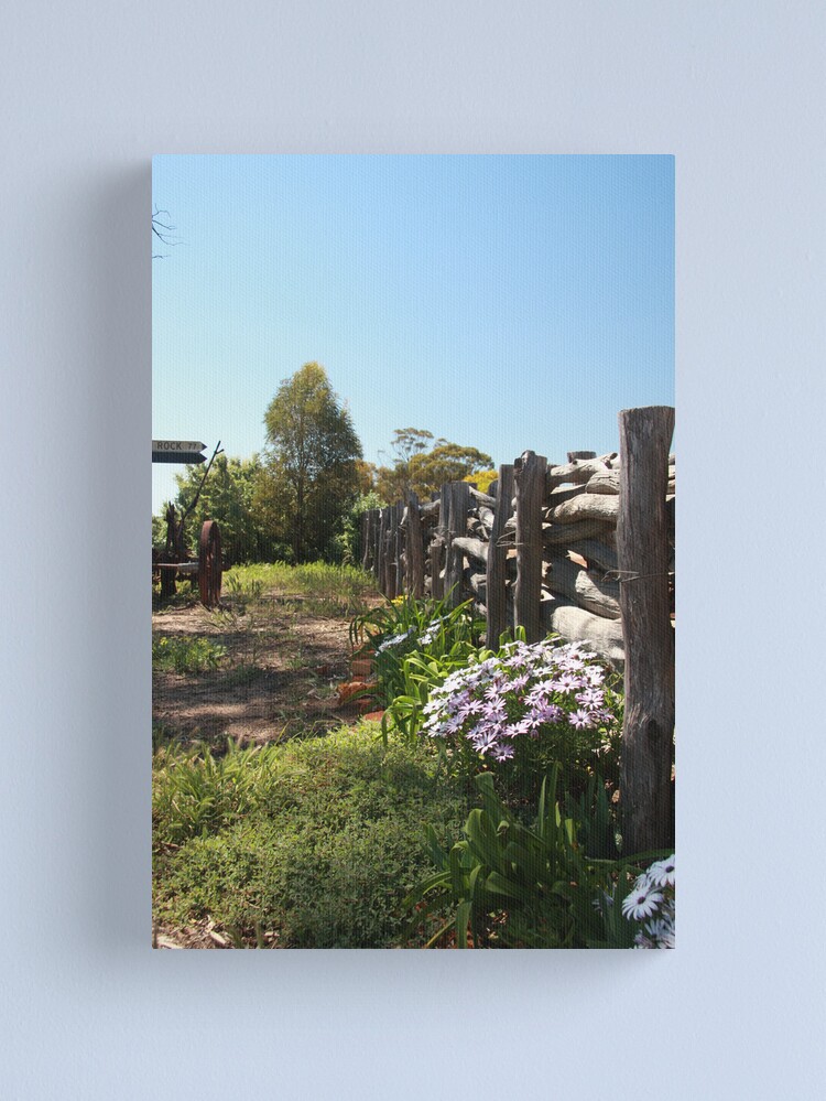 Alternate view of Flowers by the fence Canvas Print
