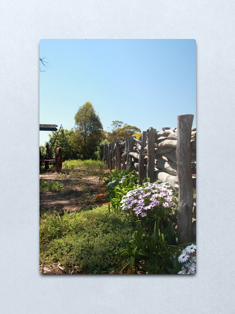 Alternate view of Flowers by the fence Metal Print